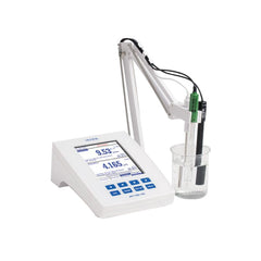 A Hanna research-grade benchtop pH meter HI5522 with a large color LCD, capacitive touch keypad, and attached electrodes and beaker.