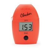 A red Hanna Iron HR Handheld Colorimeter with a digital display showing iron levels in ppm.