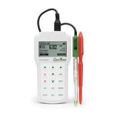 A Hanna Professional Portable pH Meter for Soil with a digital display, buttons for operation, and a conical glass tip electrode alongside a red and a green calibration certificate.