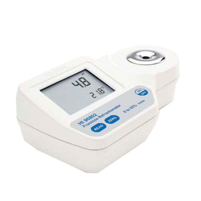 A digital refractometer for fructose measurement with a white body, display screen, and a sample well.