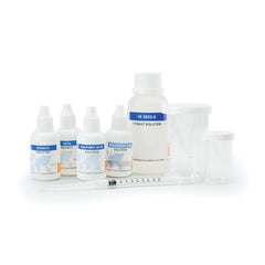 A Hanna Sulfite Test Kit HI3822 with various reagents and tools for water testing, including bottles, a syringe, and beakers.