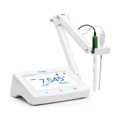 hanna benchtop advance pH/ORP meter in white body with holder for pH and temperature electrodes.