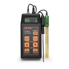 A Hanna portable pH/mV/temperature meter, model HI8424, with a digital display, control buttons, and a probe attached.