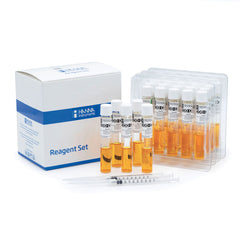 A set of Hanna brand reagent hi93754c-25 vials in a box, with individual vials containing a yellow reagent, and a syringe for measurement.