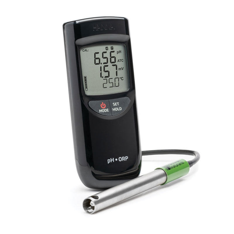 Digital pH/ORP meter HI991003 with a probe on a white background